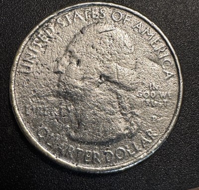2011 quarter die clash error showing ghost image of opposite die design visible in the field