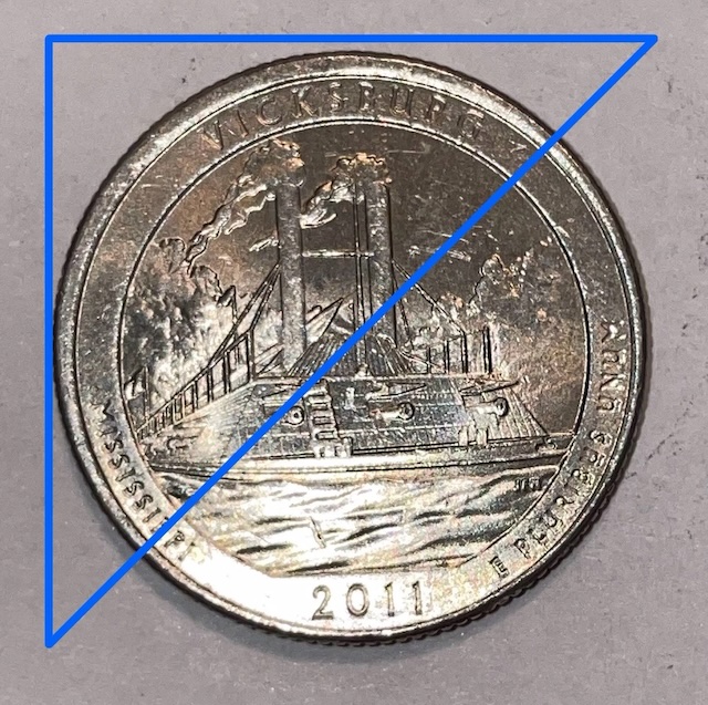 2011 quarter off-center strike error with crescent of blank planchet visible and design shifted to one side